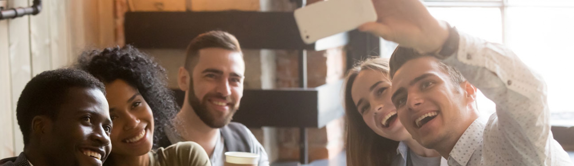 group of employees taking a selfie