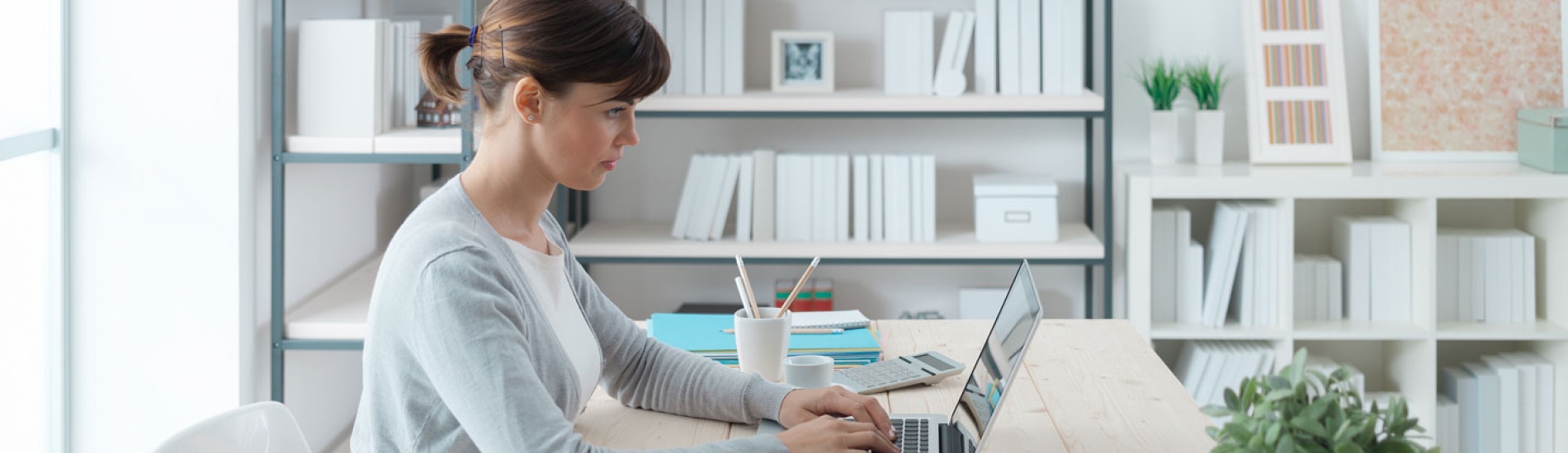 woman preparing for a virtual interview on a laptop 